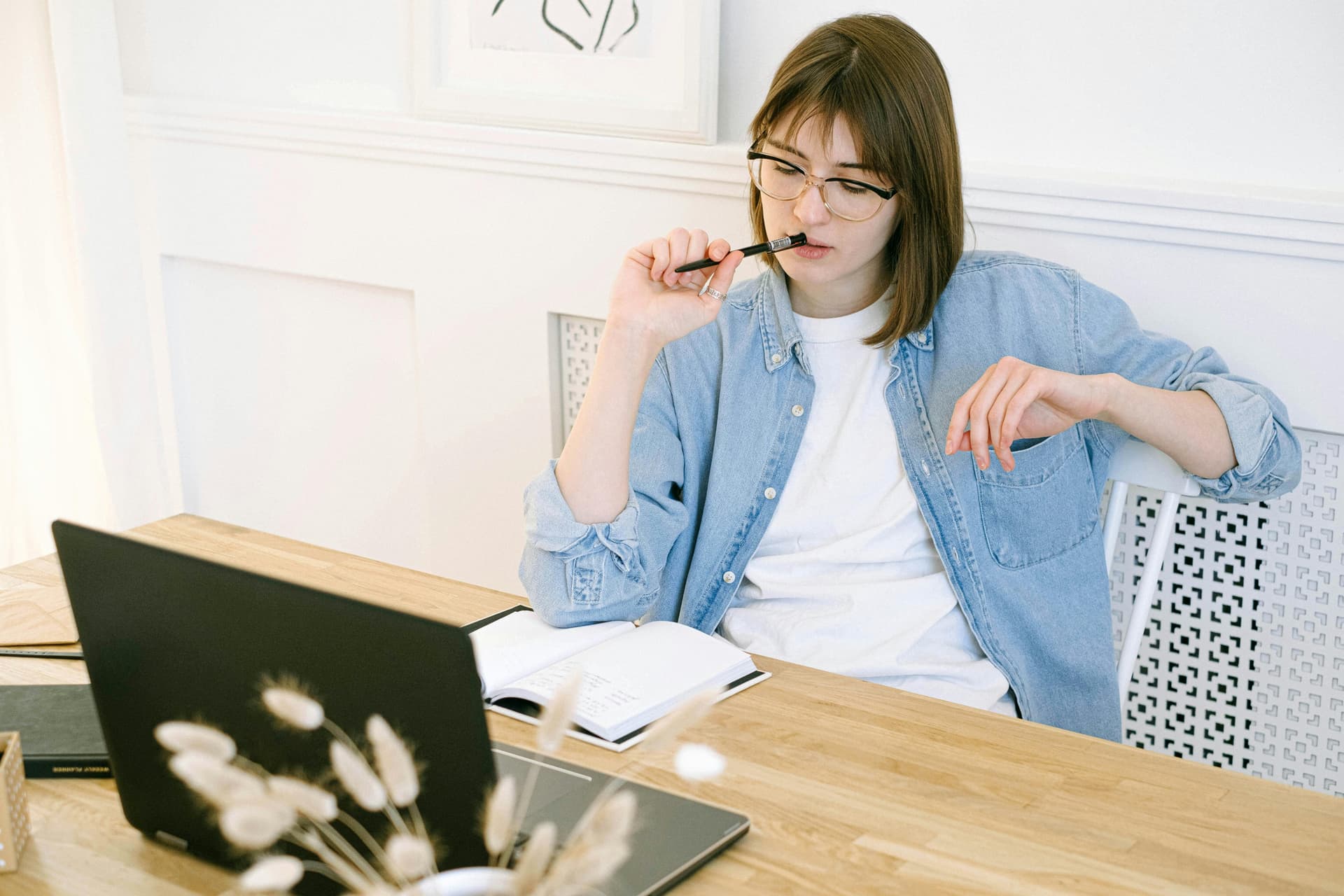 Woman working in home office, representing modern blogging and WordPress themes