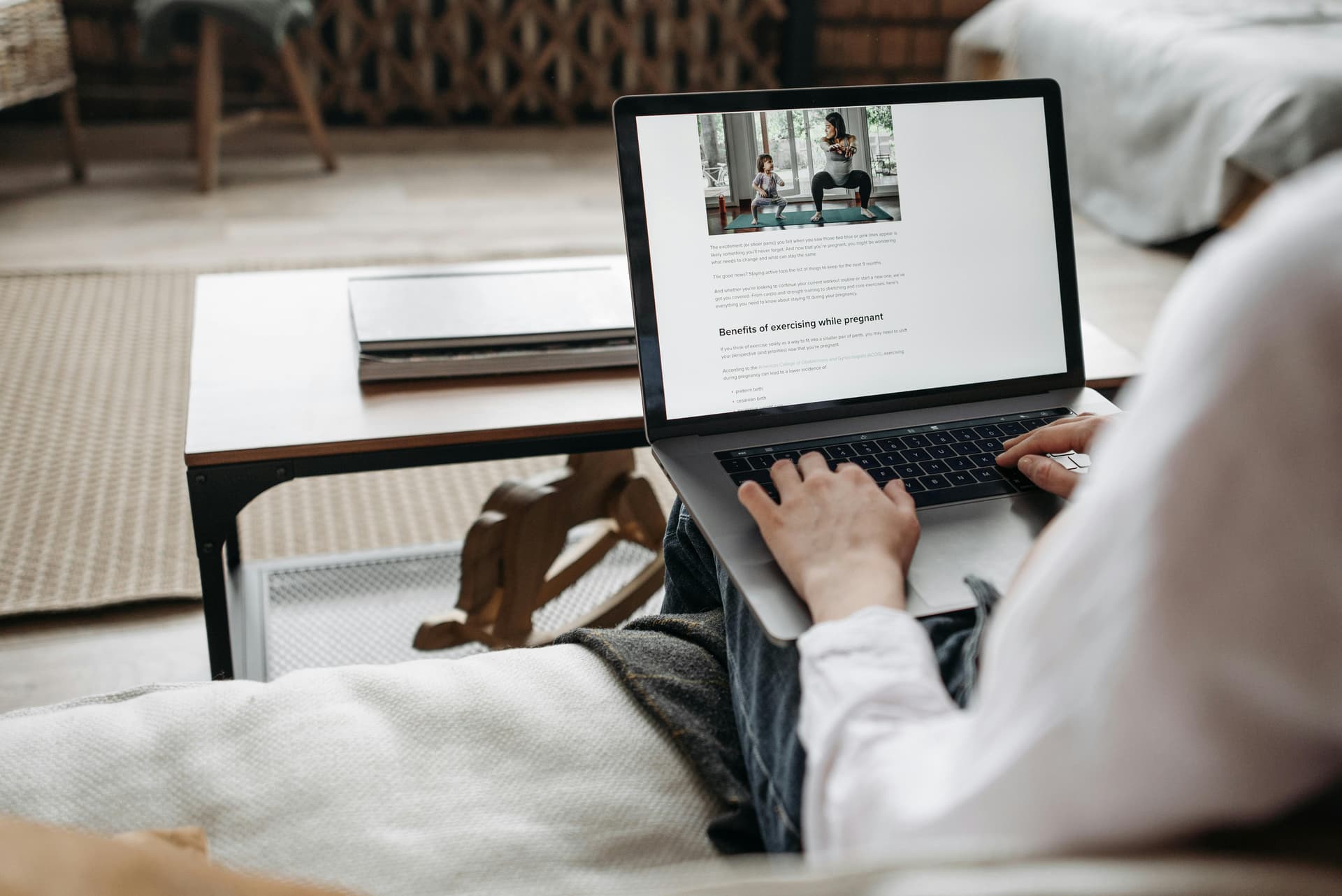 Person typing on a laptop, representing blogging and online presence